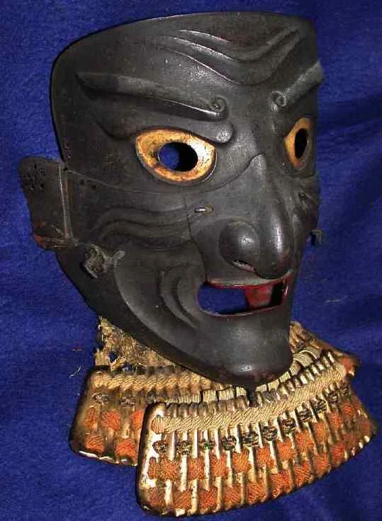 Somen - maska całotwarzowa Esej o samurajskim uzbrojeniu - maski ochronne na twarz, czyli men yoroi, czy menpo - ich budowa, symbolika i historia.