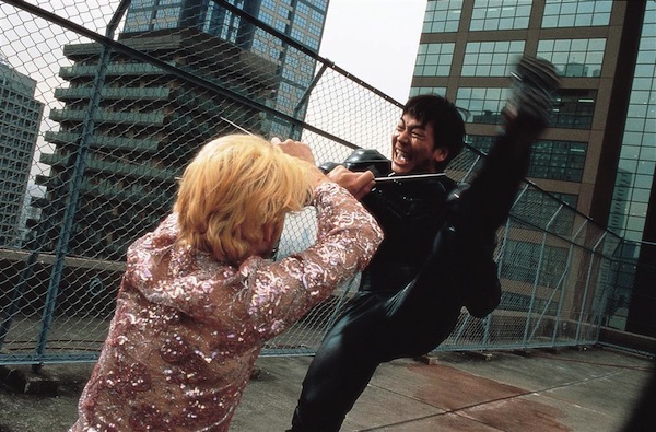 Ichi fighting Kakihara, at the finale of the Japanese movie Koroshiya-1, based on manga. Article about the movie "Koroshiya Ichi" ("Ichi the Killer" by Takashi Miike based on Japanese manga by Hideo Yamamoto "Ichi the Killer". Kakihara, Ichi, Jiiji, Jiro and Saburo and more.