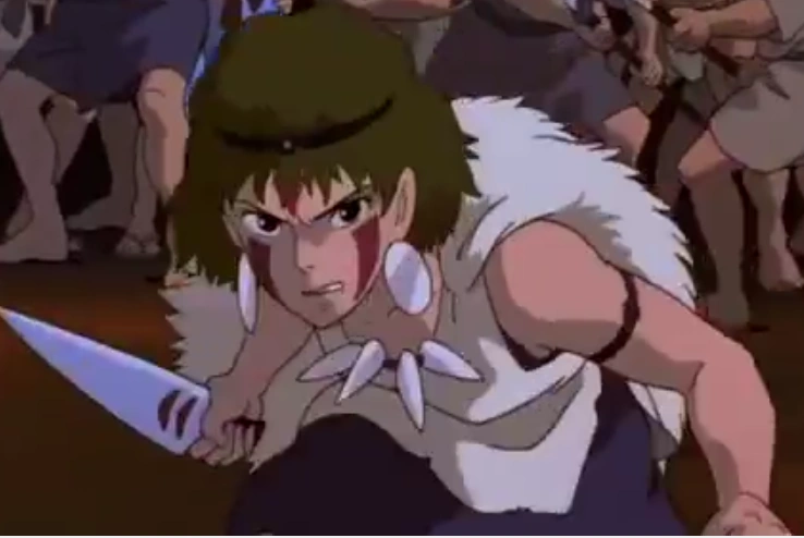 San angry and wanting blood of Lady Eboshi from Irontown - Japanese anime "Princess Mononoke" by Hayao Miyazaki from Ghibli Studio. Article / essay about Japanese anime Mononoke Hime ("Princess Mononoke") by Hayao Miyazaki in Studio Ghibli. What is the meaning of San (Mononoke) and what values does this character convey?