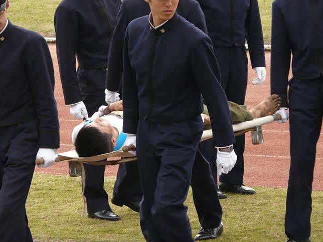 Bo Taoshi is a sport with many injuries, Japan. Article about Bo-Taoishi - Japanese team sport game. Chaotic, brutal, dynamic game of pole toppling: Bo Taoishi from Japan.
