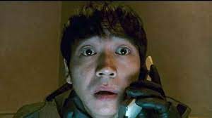 Ichi the Killere, movie about yakuza - Ichi receiving a call from Jiiji. Article about the movie "Koroshiya Ichi" ("Ichi the Killer" by Takashi Miike based on Japanese manga by Hideo Yamamoto "Ichi the Killer". Kakihara, Ichi, Jiiji, Jiro and Saburo and more.