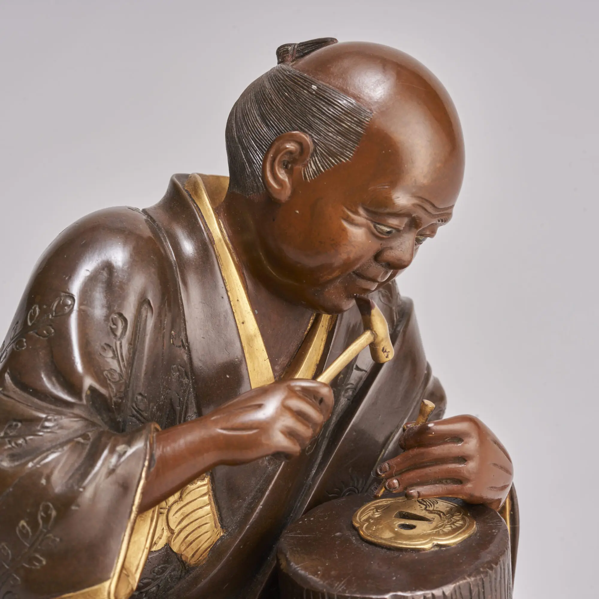 Historia Japonii - wykonanie tsuby dla samurajskiej katany wymagało kunsztu rzemieślnika - artysty Esej / asrtykuł o Tsuba - sztuce rzemieślniczej wytwarzania osłon rękojeści mieczy katana. Rola Tsuby w historii i wykorzystanie tego motywu w japońskich