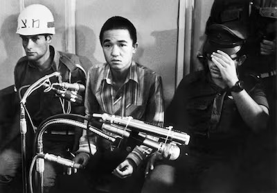 Shiomi Takaya - współzałożyciel Japanese Red Army. Artykuł o JRA (Japanese Red Army) - ekstremistycznej organizacji terrorystycznej walczącej w imię komunizmu.