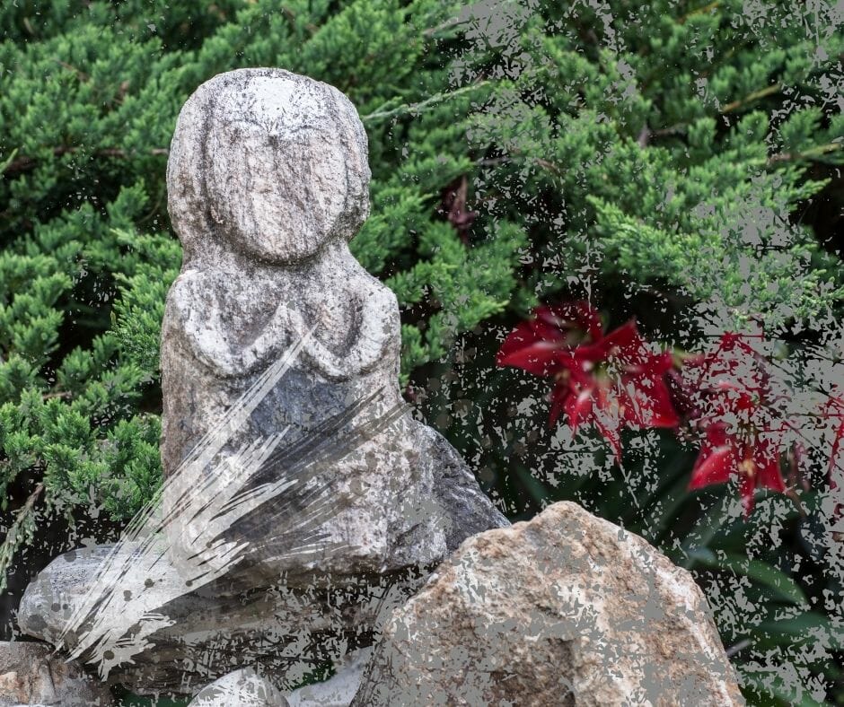 A kodama statue, Japan. Article about Kodama - forest trees spirits and ghosts (youkai or kami) from Japanese mythology and folklore, known also from "Mononoke Hime" by Hayao Miyazaki.