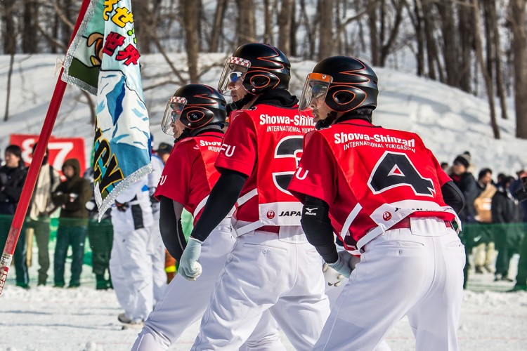 Yukigassen players - Japanese proffessional snowball fight sport. Article about Japanese proffessional sport of snaball fight: Yukigassen originating from Sobetsu on Hokkaido, Japan.