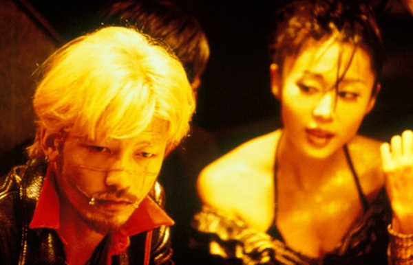 Kakihara and Karen - Ichi the Killer (Koroshiya Ichi) - Japanese mpovie on Yakuza, based on manga. Article about the movie "Koroshiya Ichi" ("Ichi the Killer" by Takashi Miike based on Japanese manga by Hideo Yamamoto "Ichi the Killer". Kakihara, Ichi, Jiiji, Jiro and Saburo and more.