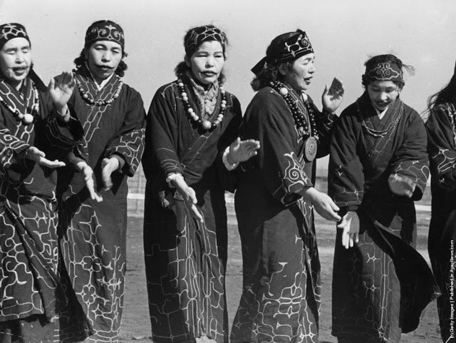 Ainu women in Hokkaido, Japan. Essay about Polish researchers' role in reasearch of the Ainu people - Ainu living on Hokkaido and Sakhalin. Role of Bronislaw Pilsudski in early linguistic and cultural research of Ainu people of Northern Japan.